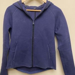 Selling a lululemon zip up sweater in a size 6 in the colour navy blue